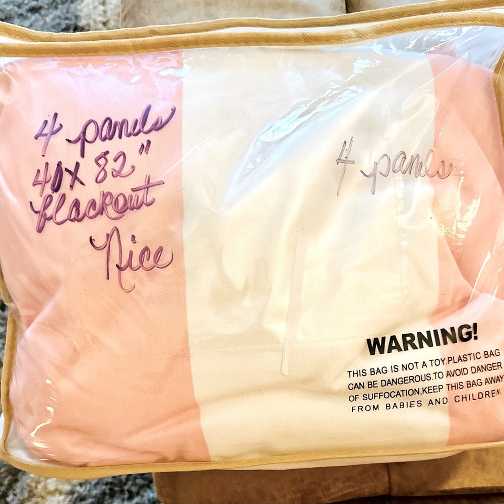 Very nice and excellent shape pink and white 4 panel curtains. 40x82 blackout